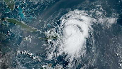 Ernesto intensifies into Category 1 hurricane north of Puerto Rico