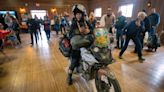 Wisconsin woman aiming to be youngest to travel the world by motorcycle returns home