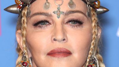 Madonna back to writing biopic after completing tour