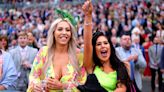 Aintree racegoers enjoy Ladies Day – but fighting breaks out