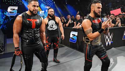 The Bloodline's Tama Tonga & Tanga Loa Retain WWE Tag Titles In SmackDown Ladder Match - Wrestling Inc.