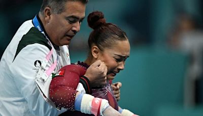 Gymnast refuses to quit Olympics with torn ligament; ends routine crying in pain