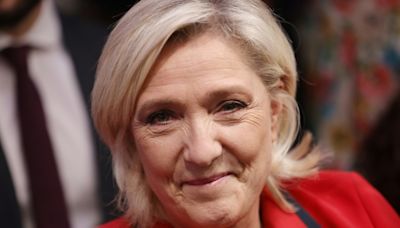 French far right, Macron camp clash over Le Pen army warning