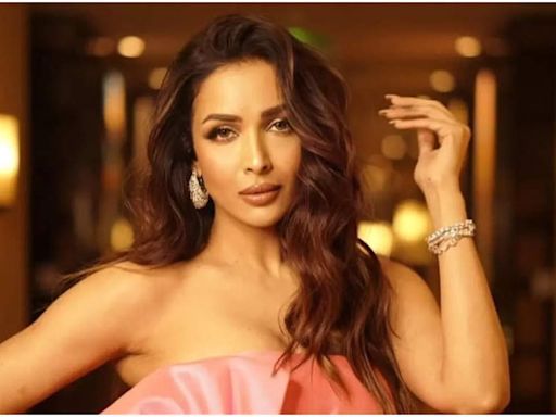 Malaika Arora faces criticism for picking up garbage on the road; netizens say, 'she knows the cameras are on' | Hindi Movie News - Times of India