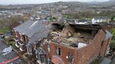 Tornado destroys homes in ‘supercell thunderstorm’ as flights grounded and thousands without power