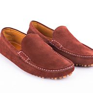 Moccasins are a comfortable and casual slip-on shoe for men. They are typically made of soft leather or suede and have a flexible sole. They are great for wearing around the house or running errands. Driving moccasins are a popular style of moccasin that have a rubber sole and are designed for driving. They are comfortable and provide good traction on the pedals.