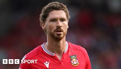 George Evans: Midfielder signs new Wrexham deal