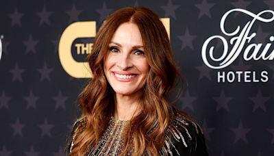 Julia Roberts cozies up to husband Danny Moder in a mini dress in new snap from Wimbledon
