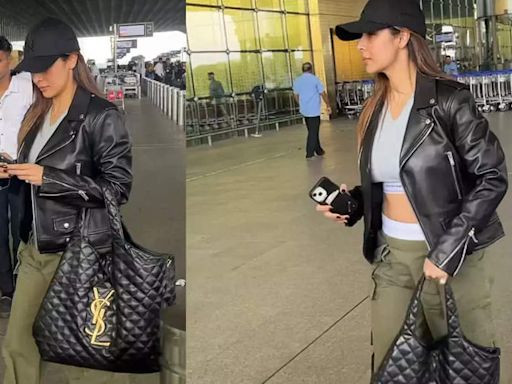 Malaika Arora's bag of whopping cost price steals the show as she makes an appearance in the city | Hindi Movie News - Times of India