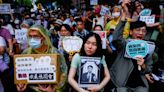 Tens of thousands protest against contentious Taiwan parliament reforms