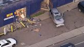 Car smashes into Detroit liquor store, leaving huge holes in building