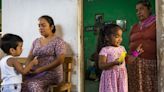 A Oaxacan community prays for two brothers — one dead, one alive — who were in the San Antonio trailer