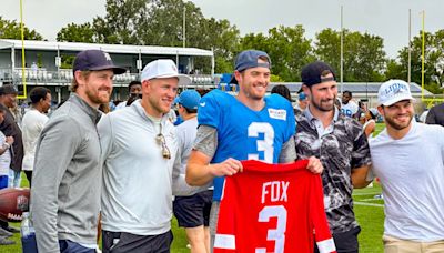 Red Wings gift custom jerseys to Lions at practice, commend team’s turnaround