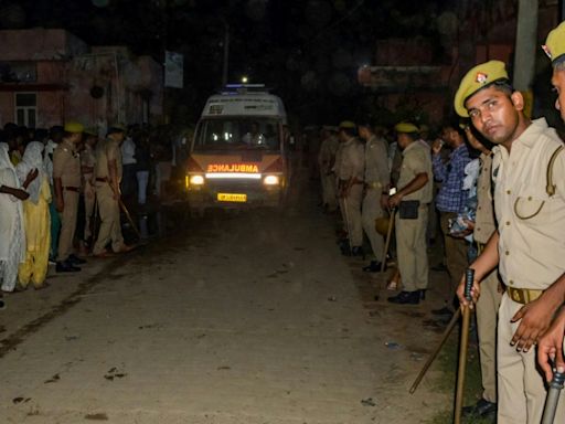 107 killed in stampede at India religious gathering