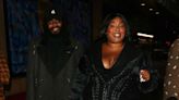 Lizzo’s Chaotic LBD Included a Plunging Neckline and Sky-High Lace-Up Slits