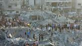 Israel defends strike on Jabalia refugee camp thought to have killed dozens