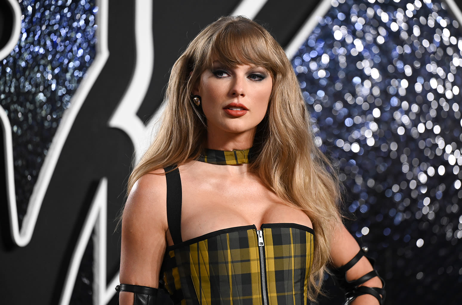 Taylor Swift Channels ‘Clueless’ in Yellow Plaid Look on 2024 VMAs Red Carpet: It’s ‘Giving Gothic Cher’