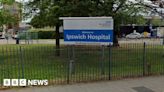 Ipswich: Patient scales roof of hospital building