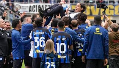 Inter celebrates Serie A title with an open-air bus parade. Abraham secures Roma a draw at Napoli