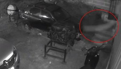 Moment mystery ‘fast moving orb’ knocks man out on stairs in chilling CCTV