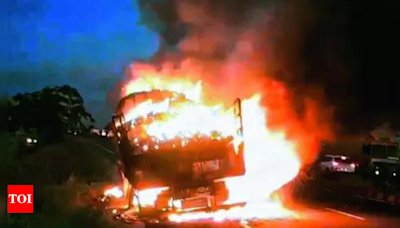 One killed as trailer truck overturns, catches fire in Pune district | India News - Times of India