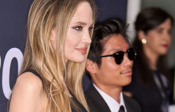 Angelina Jolie and Brad Pitt’s son Pax has facial scars in rare red carpet appearance