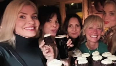 Holly Willoughby enjoys a Guinness as she celebrates St Patrick’s Day with Laura Whitmore and pals