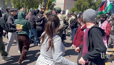 Pro-Palestinian protesters march downtown after police raid UC San Diego encampment, arresting dozens