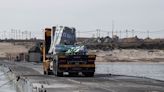 Gaza pier resumes operations as aid collects in marshalling area