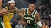 Damian Lillard's 35-point 1st half helps Bucks beat Pacers 109-94 without Giannis in playoff opener