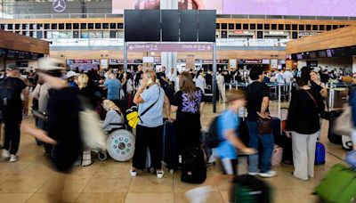 'Bedlam': Grounded flights and check-in chaos at airports all over Europe due to major IT outage