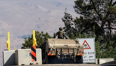 Hezbollah says it pushes back Israelis along Lebanese border after troops hoist flag