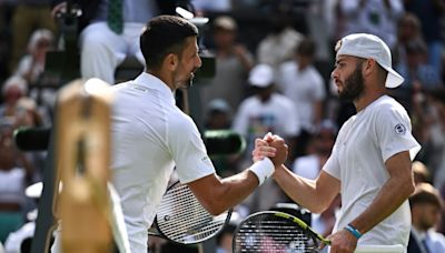 Murray saluted at Wimbledon despite doubles exit as Djokovic wins