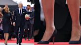 First Lady Jill Biden Looks Stylish In Navy Pumps and Animal...Print With President Joe Biden For Commemorations Marking The 80th Anniversary Of D-Day Take Place In Normandy