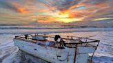 Mystery boat washes ashore in Satellite Beach; Coast Guard unaware of its origins