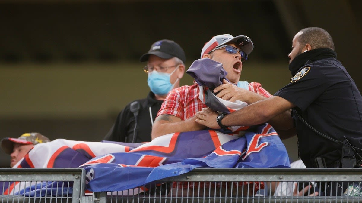 Woman forced to throw MAGA hat in trash at Cardinals game gets team's apology for staff 'misunderstanding'