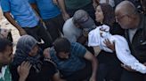 Israeli attacks kill at least 19 Palestinians, including children, across Gaza