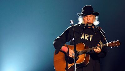 Neil Young explains tour cancellation, admits he 'felt sick' at the thought of going on stage