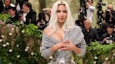 Kim Kardashian Shines in a Silver Floral Corset Gown at the 2024 Met Gala