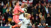England advances at Women's World Cup by edging Nigeria after James red card