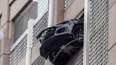 Chevrolet Camaro Left in Neutral Rolls Away, Dangles Off Charlotte Parking Garage