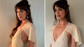 Dakota Johnson ousa com 'antivestido de noiva' transparente após notícias de crise na relação entre ela e Chris Martin e casamento em xeque