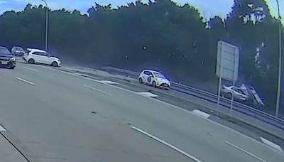 Wild moment sedan ploughed into hatchback on a motorway
