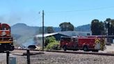 Eugene firefighters put out fire near train tracks