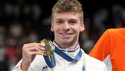 Leon Marchand is toast of Paris with astonishing Olympic double in the pool