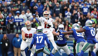 49ers dominate early, turn aside Seahawks' comeback with key INT of Geno Smith in 36-24 win