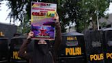 Coldplay concert in Malaysia can be stopped by organizers if the band misbehaves, government says