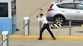 United Airlines pilot charged after bizarrely attacking Denver airport parking gate with axe