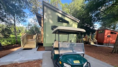 I visited Disney World's high-end campsite. Each one-bedroom cabin sleeps up to 6 adults, and golf carts are everywhere.