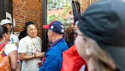 Fans lined up for hours to meet legendary basketball coach Dawn Staley at Mitchell & Ness